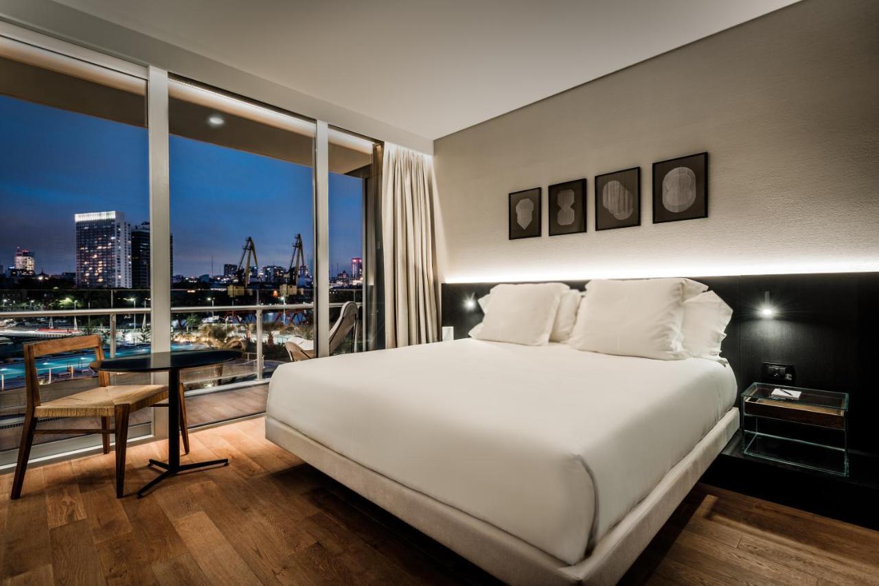 Sls Buenos Aires Puerto Madero Hotel Exterior photo A bedroom at the London Edition