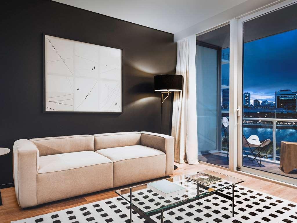 Sls Buenos Aires Puerto Madero Hotel Room photo A modern living room